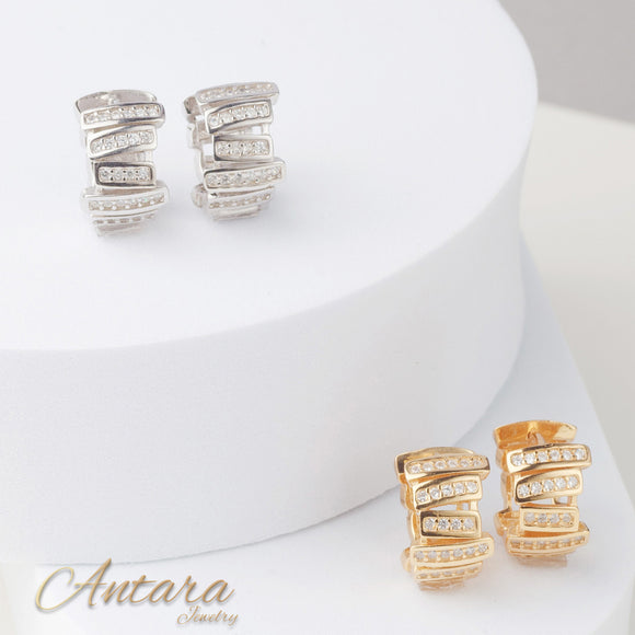 Aretes huggies pegados