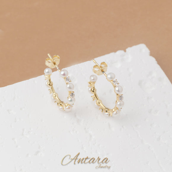 Aretes de cristal y perlas